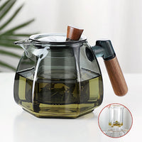 Tetera de base hexagonal con infusor y mango de madera