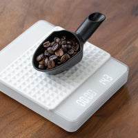 Cuchara medidora CAFEDE KONA para granos de café 20 g y dosificación diaria