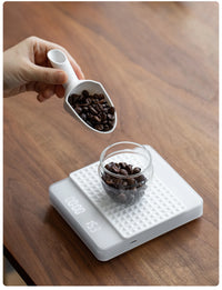 Cuchara medidora CAFEDE KONA para granos de café 20 g y dosificación diaria